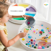 Sieve being used for water play with pom-poms